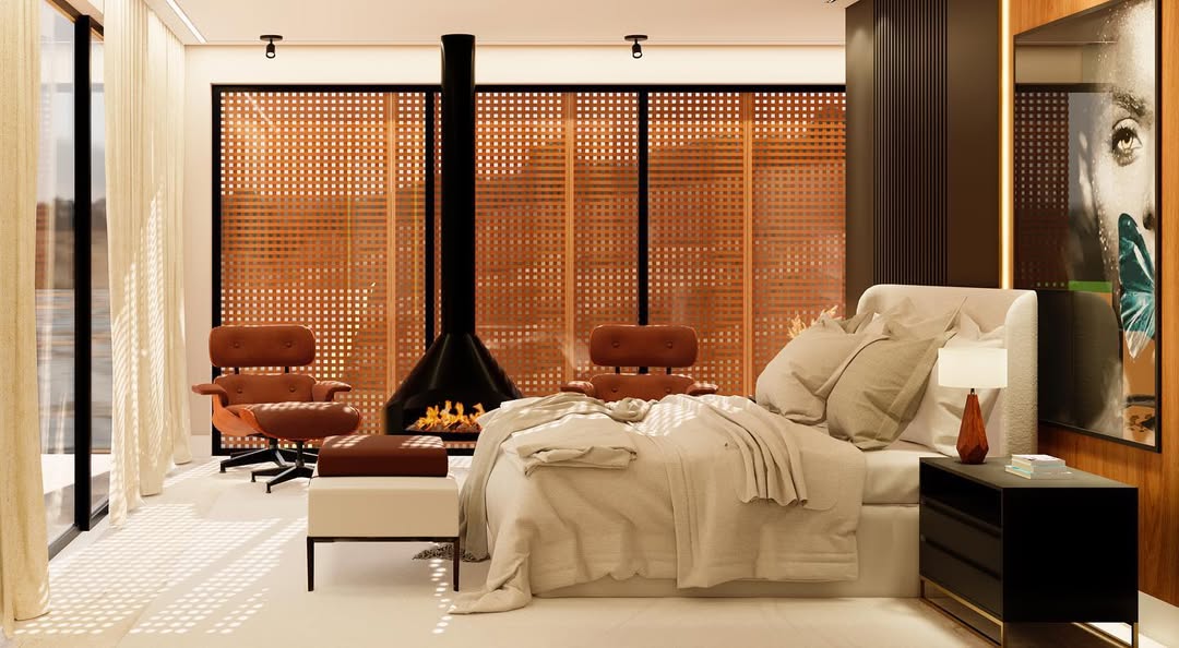 The headboard wall — fluted smoked walnut behind the bed, the suspended fireplace reading as a sculptural element, the travertine floor visible at the base.
